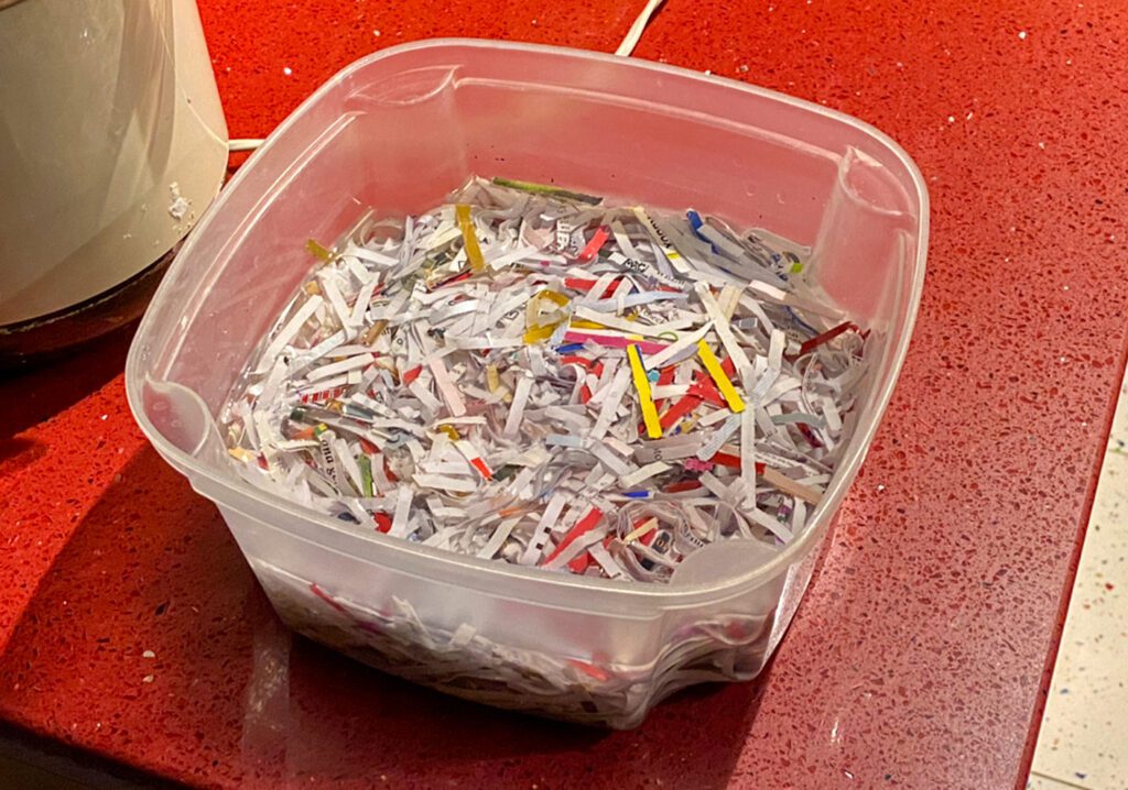 Shredded paper in a bowl of water