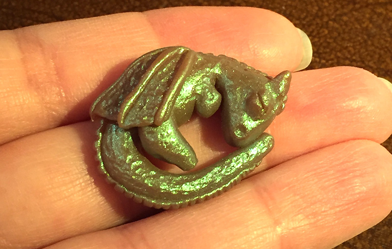 Polymer Clay Dragon resting on fingertips