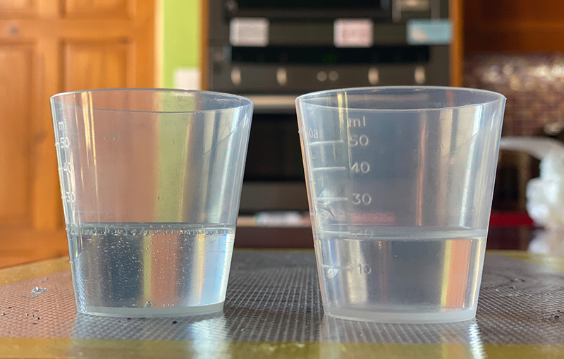 Before and after, showing how the bubbles have been almost completely removed from the resin mixture