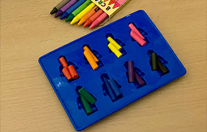 broken crayon pieces in a silicone mould