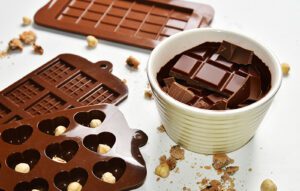 Silicone moulds for chocolate making. melting chocolate