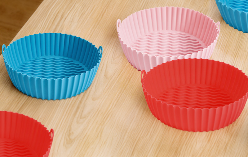 Blue, pink and red silicone air fryer liners