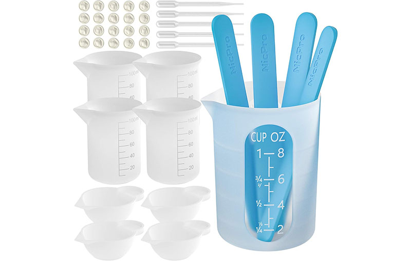 silicone mold making supplies. measuring cups, pipets and mixing sticks