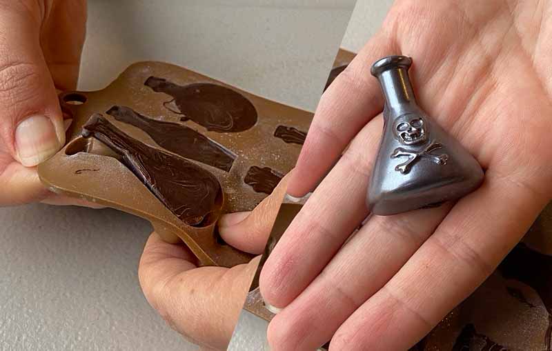 De-moulding chocolate bottle shapes from a silicone mould