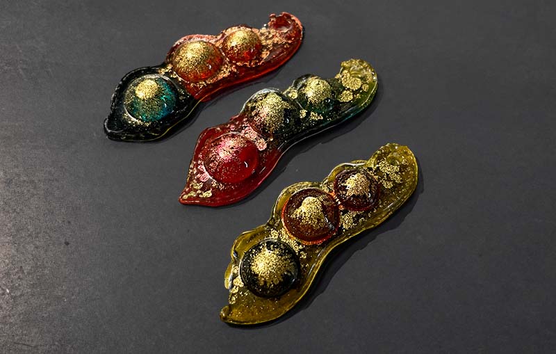 Three Resin peapods with gold alcohol ink