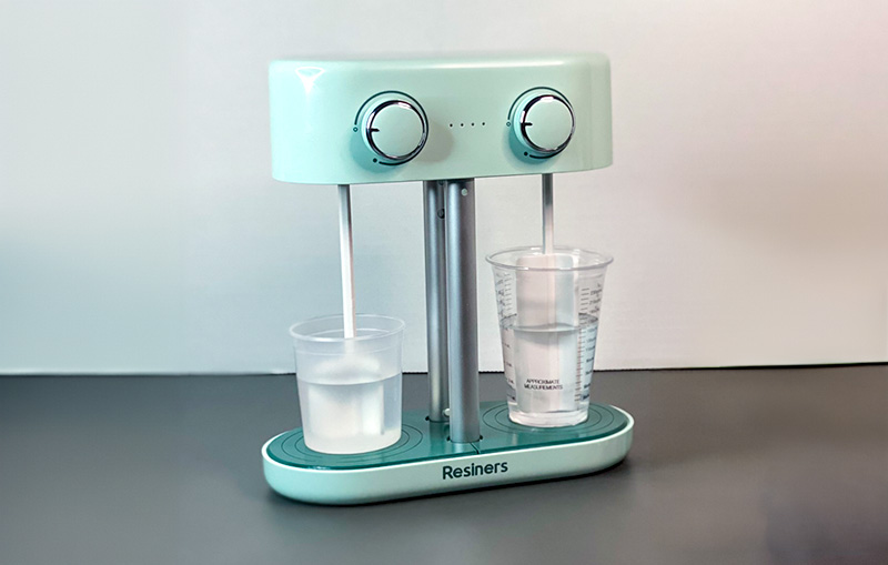 Resiners Dual-Head Resin Mixer with two mixing cups in operation.